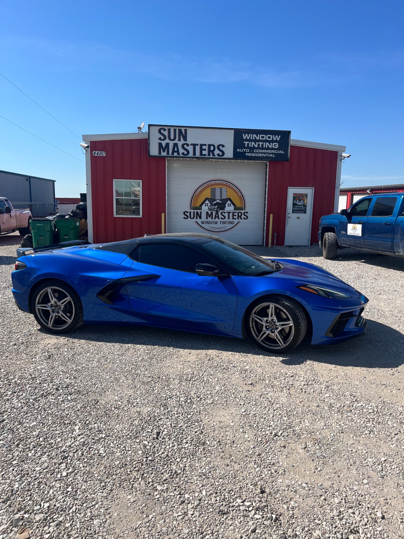 Blue Chevrolet Corvette C8 with window tinting at Sun Masters