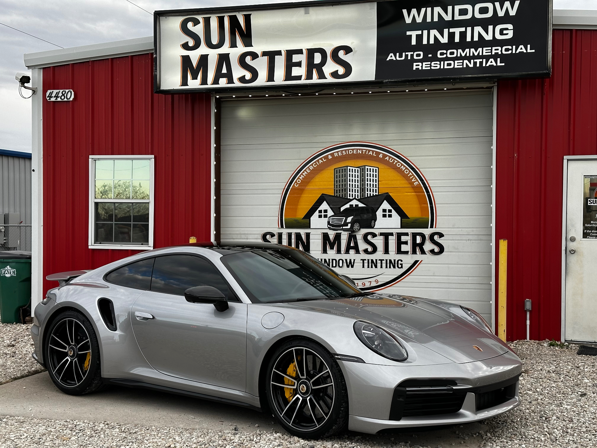 Silver Porsche 911 Turbo with window tinting at Sun Masters