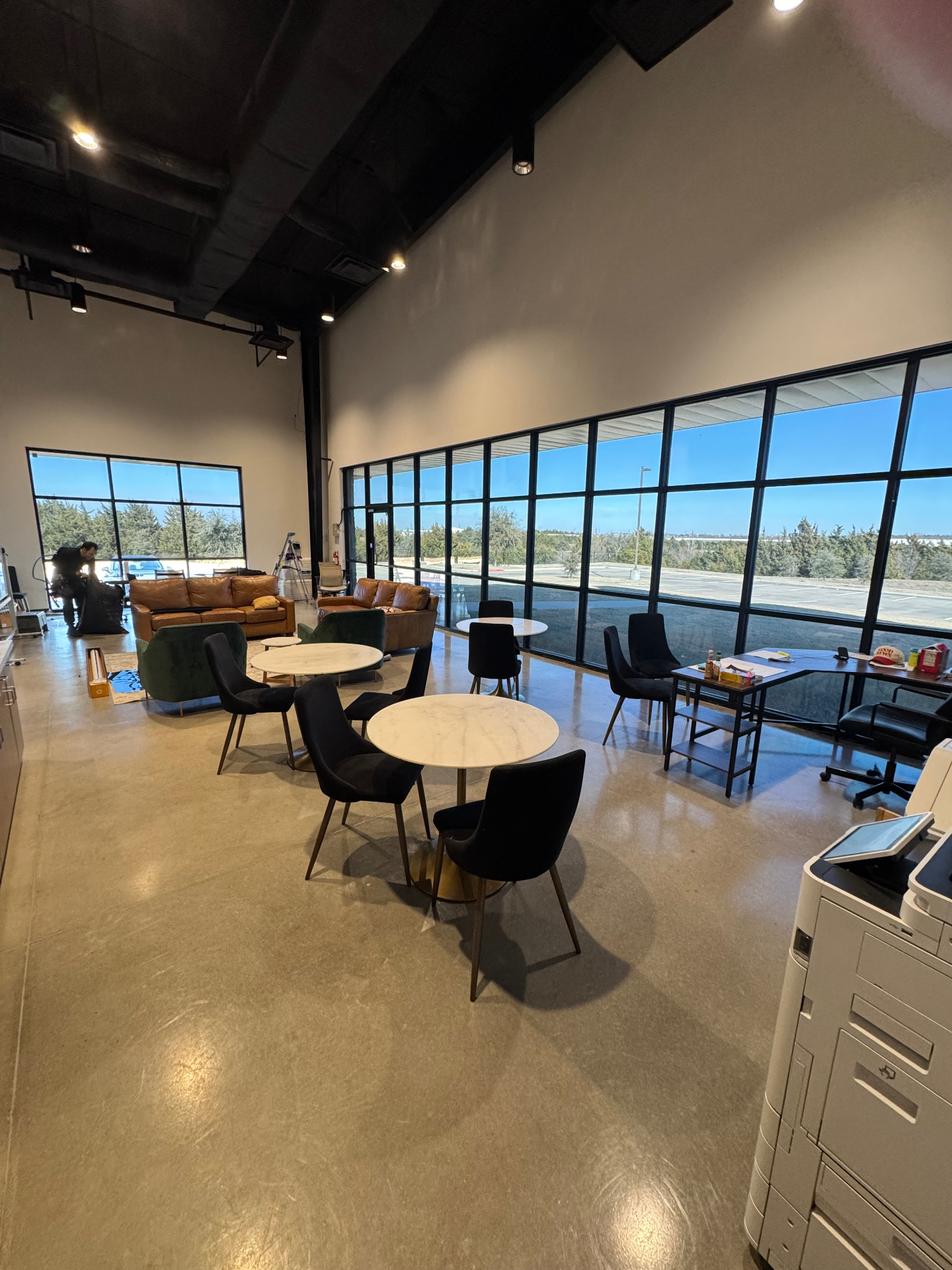 Commercial interior with floor-to-ceiling tinted windows
