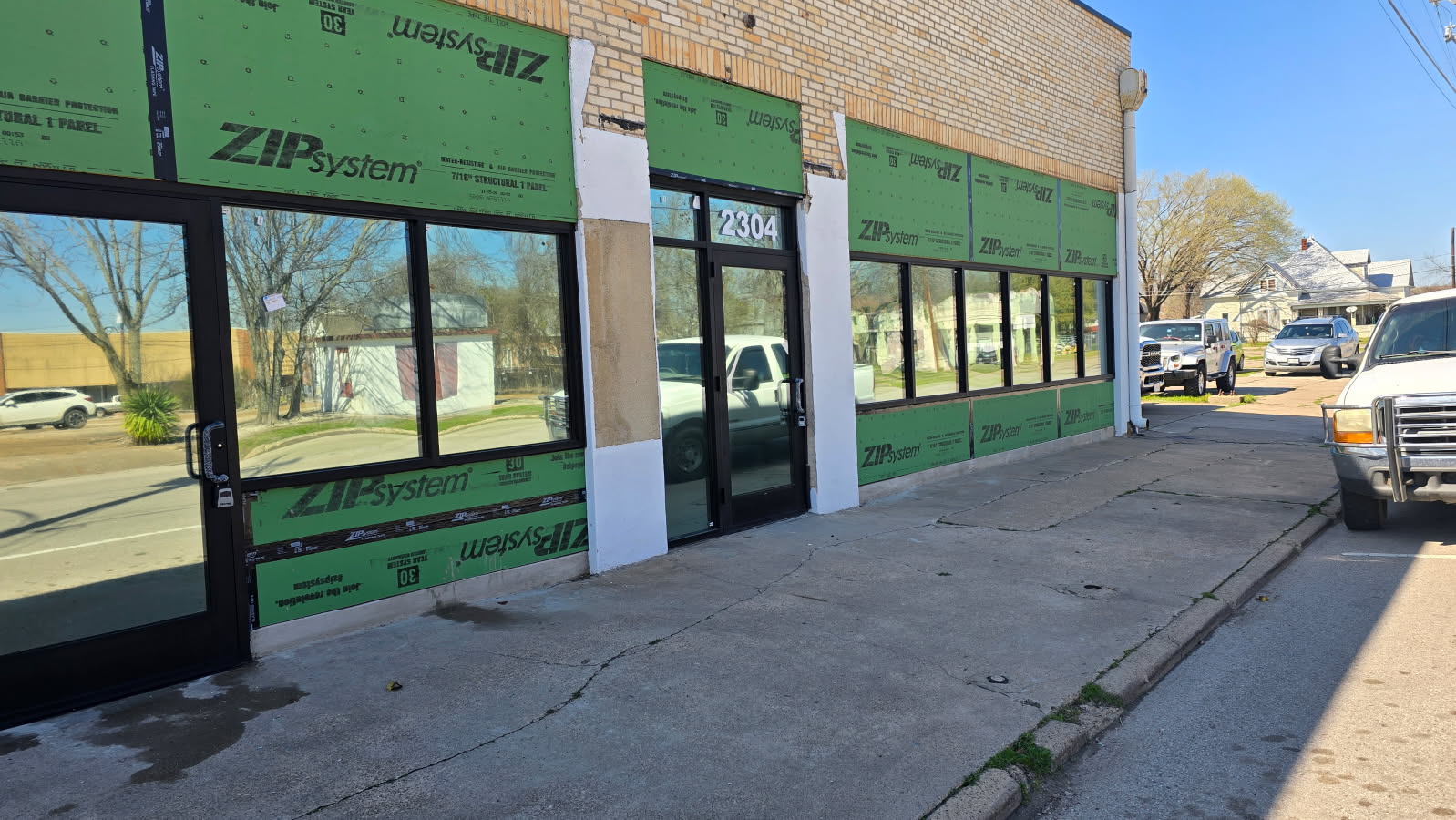 Commercial storefront under construction with new window film