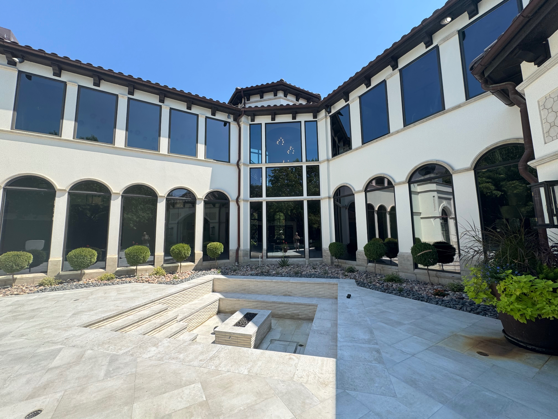Elegant courtyard with tinted arched windows